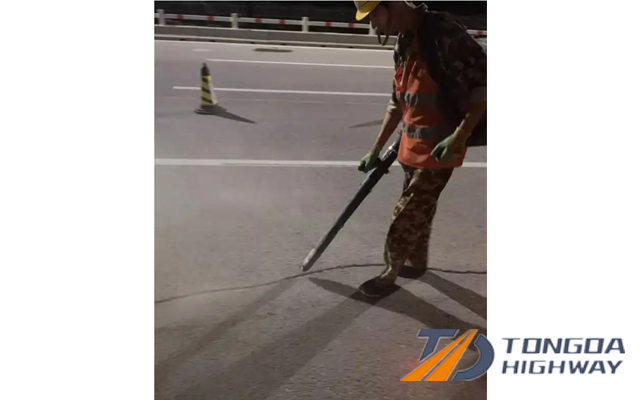 asphalt road cracks cleaning